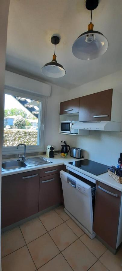 Appartement privée avec jardin et terrasse couverte dans résidence l'estuaire, avec piscine couverte, proche plage Le Verdon-sur-Mer Esterno foto